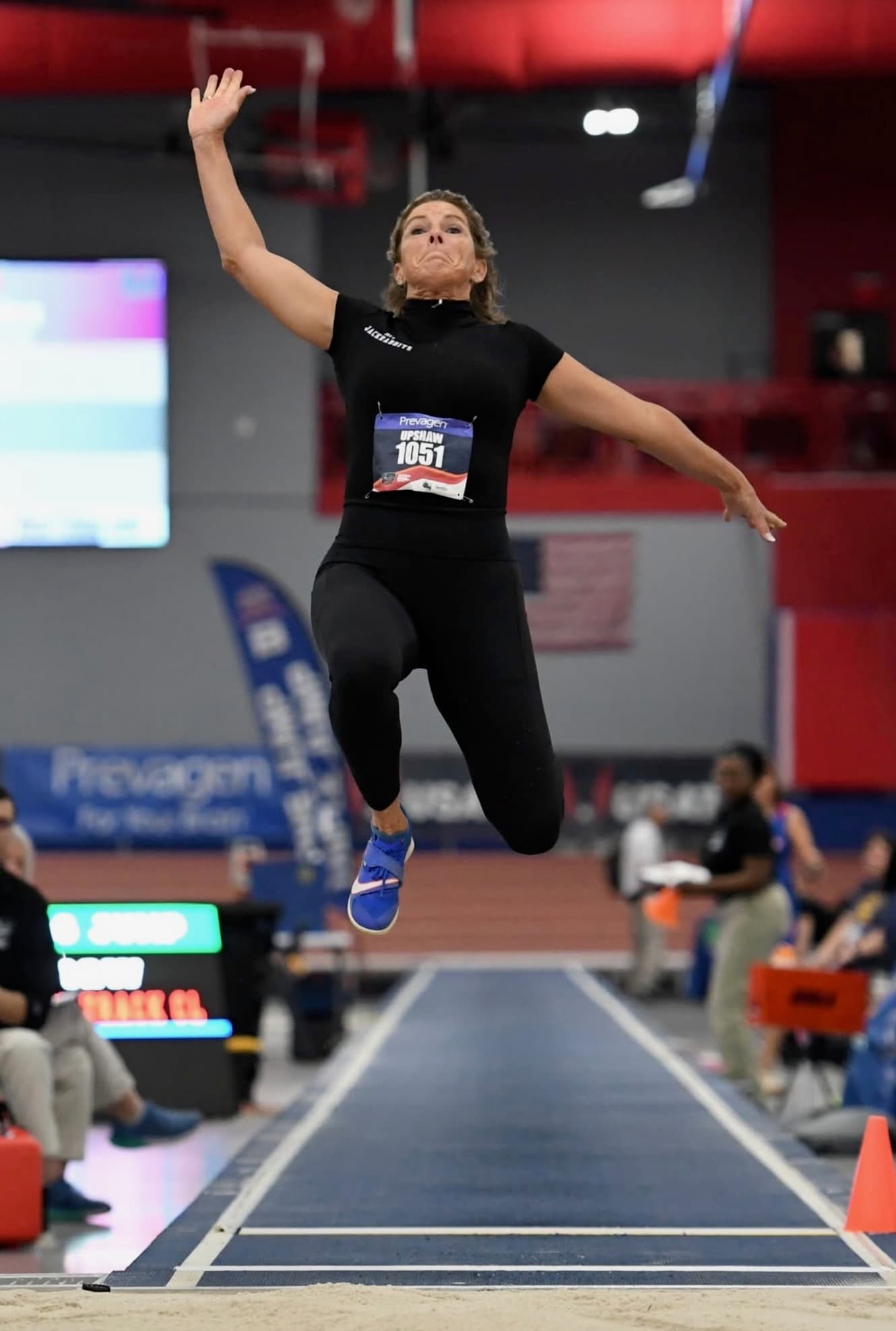 Athlete performing long jump
