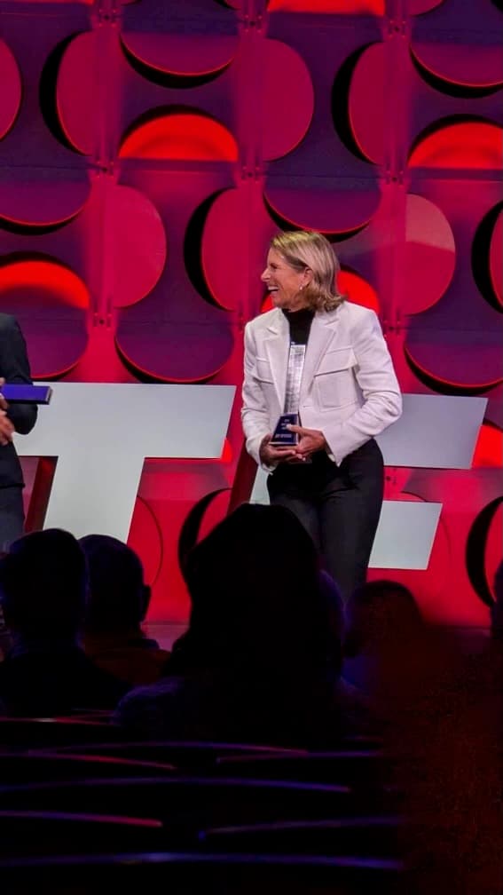 Joy Upshaw receiving an award